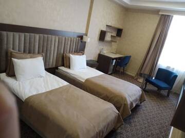 Фото номера Двухместный номер с 2 отдельными кроватями Отель Rose Inn Hotel Baku г. Баку 2