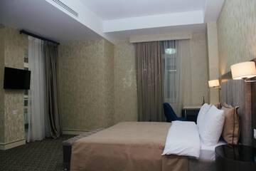 Фото номера Семейный номер с балконом Отель Rose Inn Hotel Baku г. Баку 3