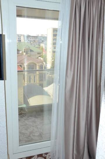 Фото номера Семейный номер с балконом Отель Rose Inn Hotel Baku г. Баку 13