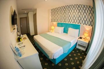 Фото номера Стандартный двухместный номер с 1 кроватью Отель Altus Hotel г. Баку 5
