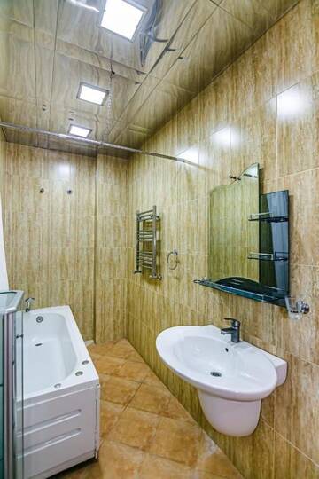 Фото номера Апартаменты с 3 спальнями Апартаменты Luxary Apartment Molocan Garden г. Баку 76