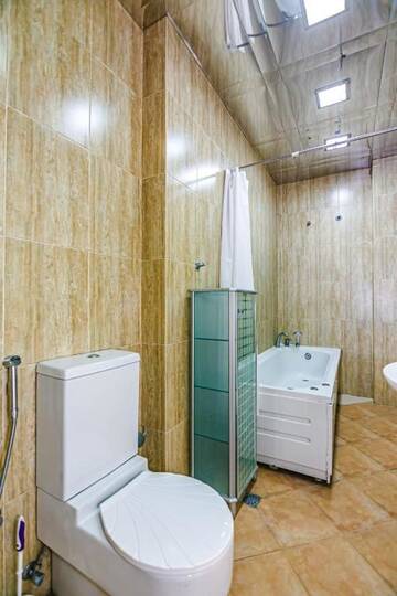 Фото номера Апартаменты с 3 спальнями Апартаменты Luxary Apartment Molocan Garden г. Баку 74