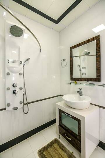 Фото номера Апартаменты с 3 спальнями Апартаменты Apartment on Tarqovu centr г. Баку 43