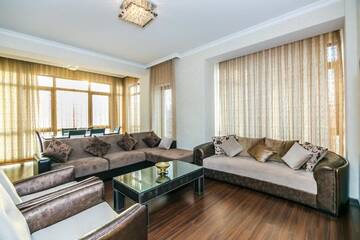 Фото номера Апартаменты с 3 спальнями Апартаменты Apartment on Tarqovu centr г. Баку 54
