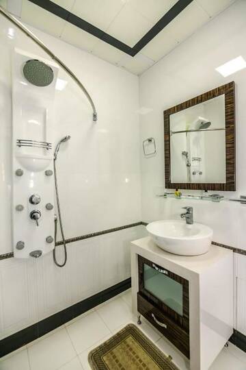 Фото номера Апартаменты с 3 спальнями Апартаменты Apartment on Tarqovu centr г. Баку 101