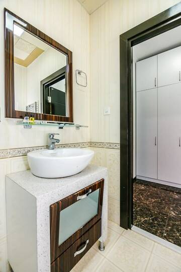 Фото номера Апартаменты с 3 спальнями Апартаменты Apartment on Tarqovu centr г. Баку 20