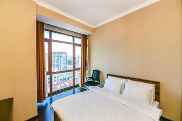 Фото номера Апартаменты с 3 спальнями Апартаменты Apartment on Tarqovu centr г. Баку 81