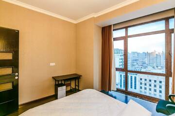 Фото номера Апартаменты с 3 спальнями Апартаменты Apartment on Tarqovu centr г. Баку 32