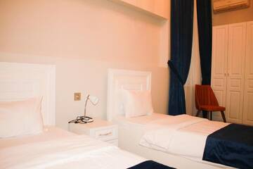 Фото номера Стандартный двухместный номер с 2 отдельными кроватями Отель Citadel Boutique Hotel г. Баку 8