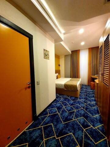 Фото номера Стандартный двухместный номер с 2 отдельными кроватями Отель Porto Hotel Baku г. Баку 2