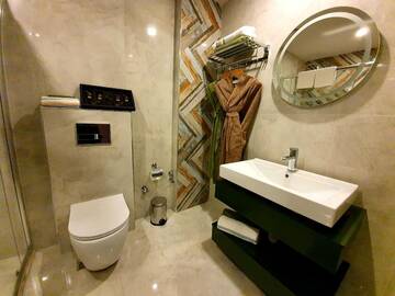Фото номера Трехместный номер Отель Porto Hotel Baku г. Баку 2