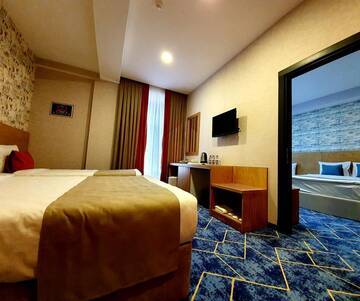 Фото номера Cемейный номер с собственной ванной комнатой Отель Porto Hotel Baku г. Баку 5