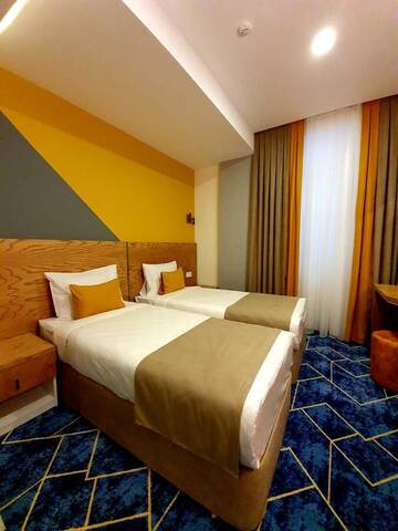 Фото номера Стандартный двухместный номер с 2 отдельными кроватями Отель Porto Hotel Baku г. Баку 3