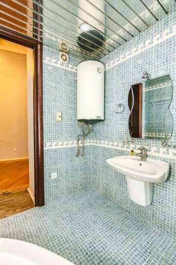Фото номера Апартаменты с 3 спальнями Апартаменты VIP APARTAMENT NIZAMI STREET г. Баку 41
