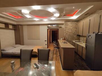 Фото номера Апартаменты с 2 спальнями Апартаменты Modern Studio Apartment г. Баку 10
