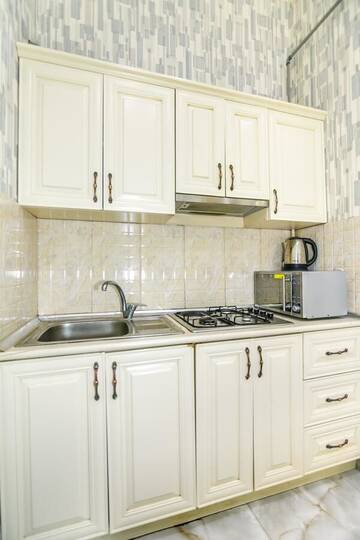 Фото номера Апартаменты с 3 спальнями Апартаменты Ideal Apartment by Time Group г. Баку 7