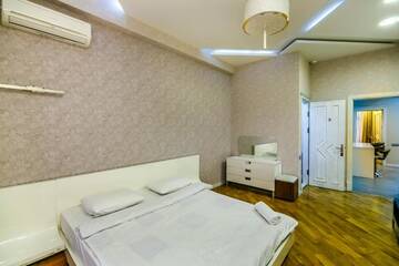 Фото номера Апартаменты Апартаменты Cozy Ferrari Apartment with full amenities by Time Group г. Баку 47