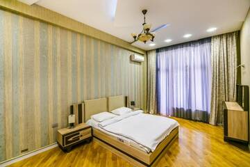 Фото номера Апартаменты Апартаменты Cozy Ferrari Apartment with full amenities by Time Group г. Баку 52