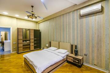 Фото номера Апартаменты Апартаменты Cozy Ferrari Apartment with full amenities by Time Group г. Баку 36