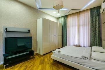 Фото номера Апартаменты Апартаменты Cozy Ferrari Apartment with full amenities by Time Group г. Баку 32