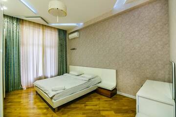 Фото номера Апартаменты Апартаменты Cozy Ferrari Apartment with full amenities by Time Group г. Баку 10
