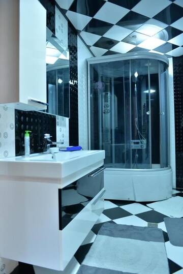 Фото номера Апартаменты с 2 спальнями Апартаменты House Impulse Xazar г. Баку 28