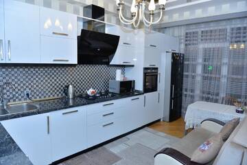 Фото номера Апартаменты с 2 спальнями Апартаменты House Impulse Xazar г. Баку 7
