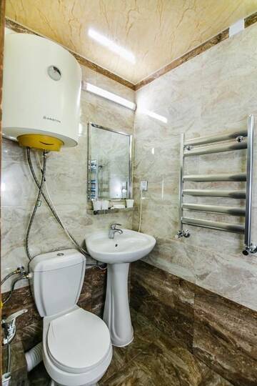 Фото номера Апартаменты с 2 спальнями Апартаменты Three Rooms Merkez г. Баку 43