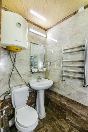 Фото номера Апартаменты с 2 спальнями Апартаменты Three Rooms Merkez г. Баку 22
