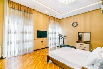Фото номера Улучшенные апартаменты с сауной Апартаменты Apartment On MADO г. Баку 73