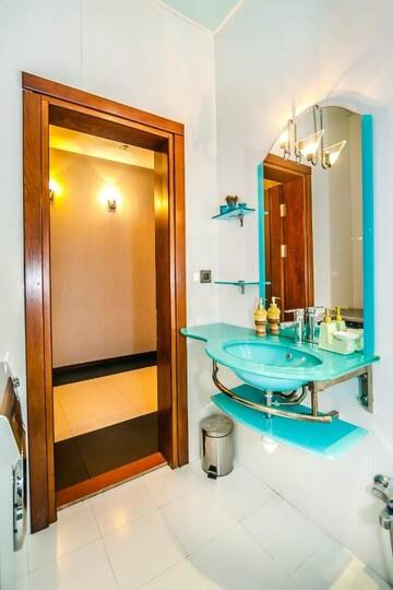 Фото номера Улучшенные апартаменты с сауной Апартаменты Apartment On MADO г. Баку 64