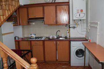Фото номера Спальное место на двухъярусной кровати в общем номере для мужчин Хостелы Talha Hostel г. Баку 7
