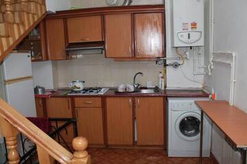 Фото номера Спальное место на двухъярусной кровати в общем номере для мужчин Хостелы Talha Hostel г. Баку 10