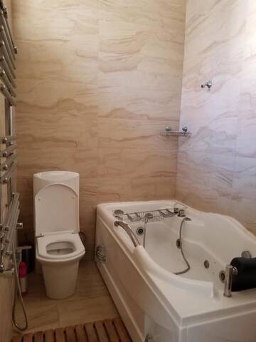 Фото номера Апартаменты с 2 спальнями Апартаменты AKHUNDOV GARDEN Apatment 2 Bedrooms г. Баку 20