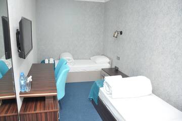 Фото номера Семейный номер с ванной комнатой Отель Mildom Hotel Baku г. Баку 7