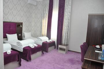 Фото номера Стандартный трехместный номер Отель Mildom Hotel Baku г. Баку 6
