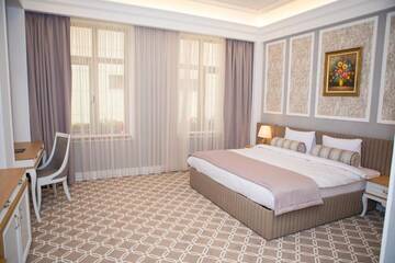 Фото номера Номер Делюкс с кроватью размера «king-size» Отель Theatrum Hotel Baku г. Баку 7