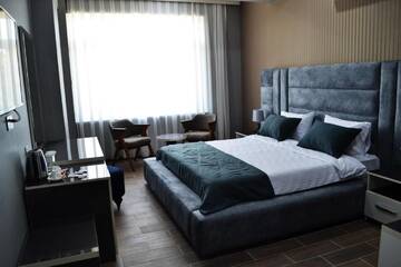 Фото номера Улучшенный двухместный номер с 1 кроватью Отель Supreme Hotel Baku г. Баку 5