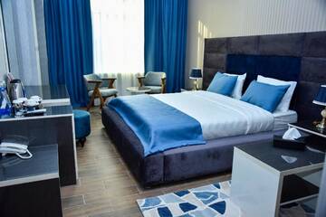 Фото номера Улучшенный двухместный номер с 1 кроватью Отель Supreme Hotel Baku г. Баку 8