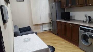 Фото номера Апартаменты с 3 спальнями Апартаменты Baku white city big apartmant г. Баку 35