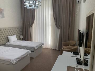 Фото номера Стандартный двухместный номер с 2 отдельными кроватями Отель Sahil Park Hotel г. Баку 4
