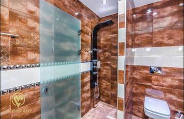 Фото номера Апартаменты с балконом Апартаменты Deluxe Apartment on Tarqovu centr г. Баку 100