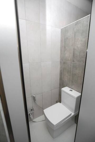 Фото номера Номер Делюкс (для 2 взрослых и 1 ребенка) Хостелы Alfa Hotel &amp; Hostel г. Баку 4