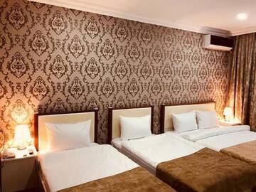 Фото номера Стандартный трехместный номер Отель NORTH WEST HOTEL BAKU г. Баку 8