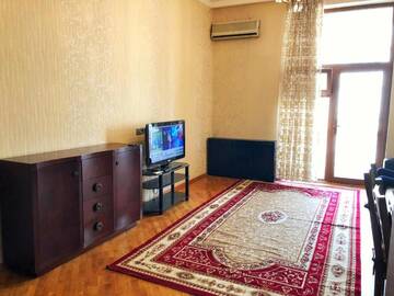 Фото номера Апартаменты с 3 спальнями Апартаменты Cosy Apartment in the heart of Baku г. Баку 19