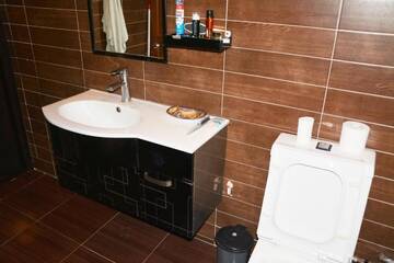 Фото номера Апартаменты с 3 спальнями Апартаменты Cosy Apartment in the heart of Baku г. Баку 14