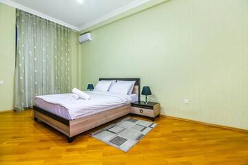 Фото номера Апартаменты с 3 спальнями Апартаменты Apartment On Al Bahar г. Баку 49