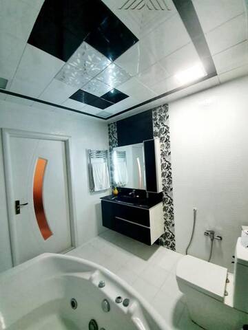 Фото номера Апартаменты с 2 спальнями Апартаменты TOURIST APARTMENT г. Баку 26