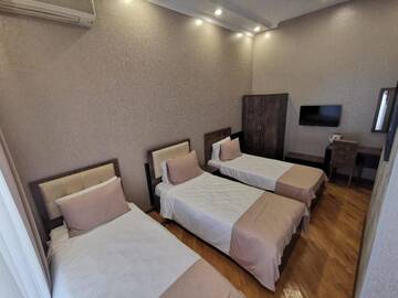 Фото номера Трехместный номер «Комфорт» с душем Отель Soprano Hotel г. Баку 2