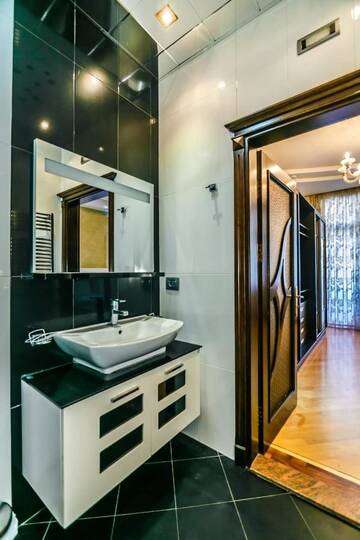 Фото номера Апартаменты с 3 спальнями Апартаменты Luxary Apartments г. Баку 38